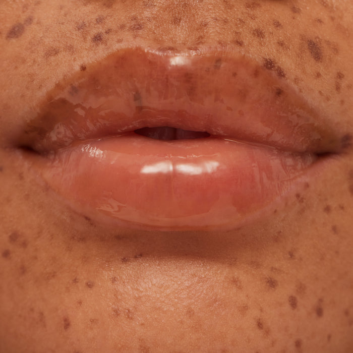 Close-up of a person's lips with visible skin texture