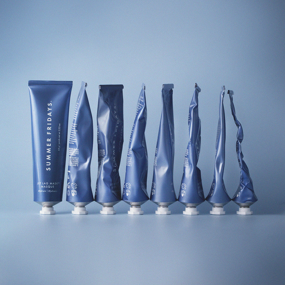 Blue tubes of Summer Fridays product on a blue background